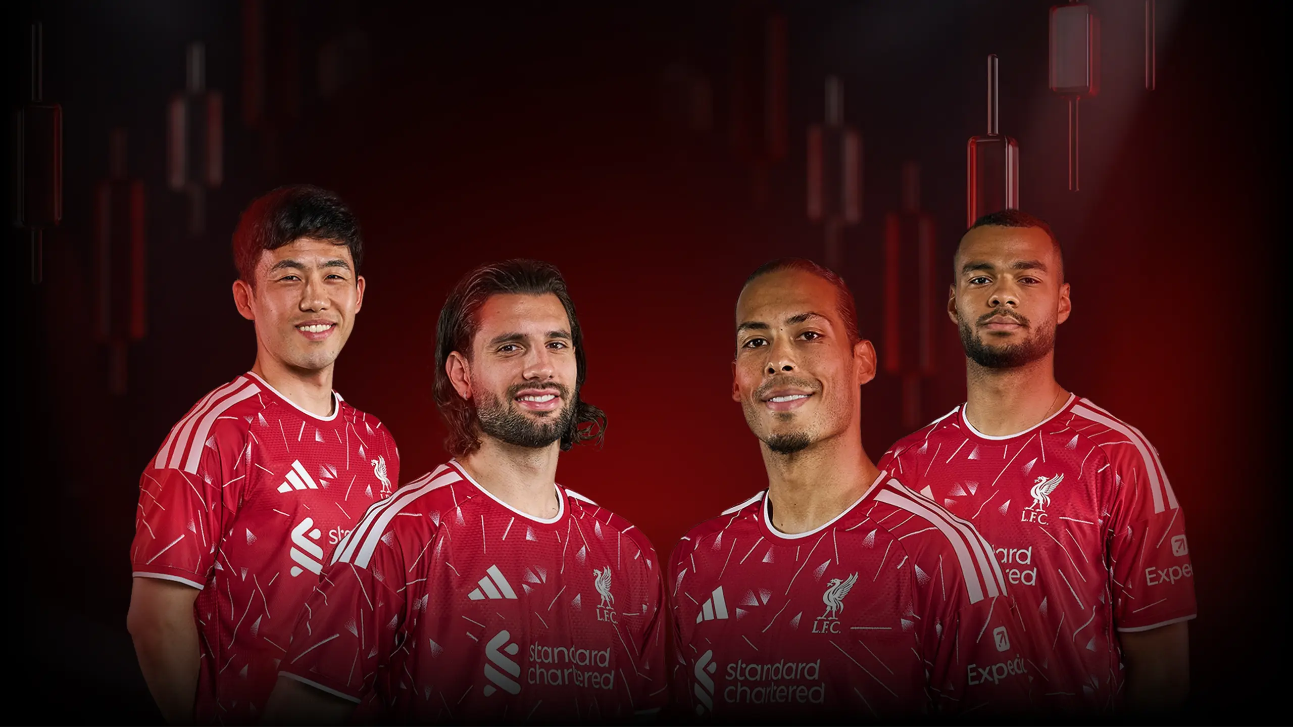 Four Liverpool FC players in red home jerseys stand together against a dark red backdrop.