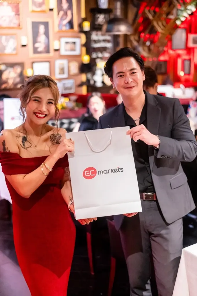 Guest receiving an EC Markets gift bag at the KOP Run After Party