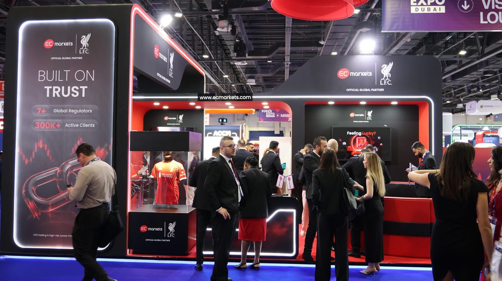EC Markets booth featuring Liverpool FC partnership branding in Dubai