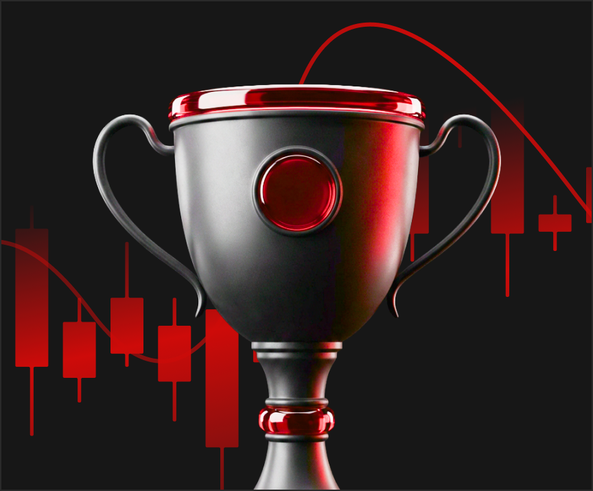 Shiny trophy with red trim in front of a red candlestick stock chart on a dark background.